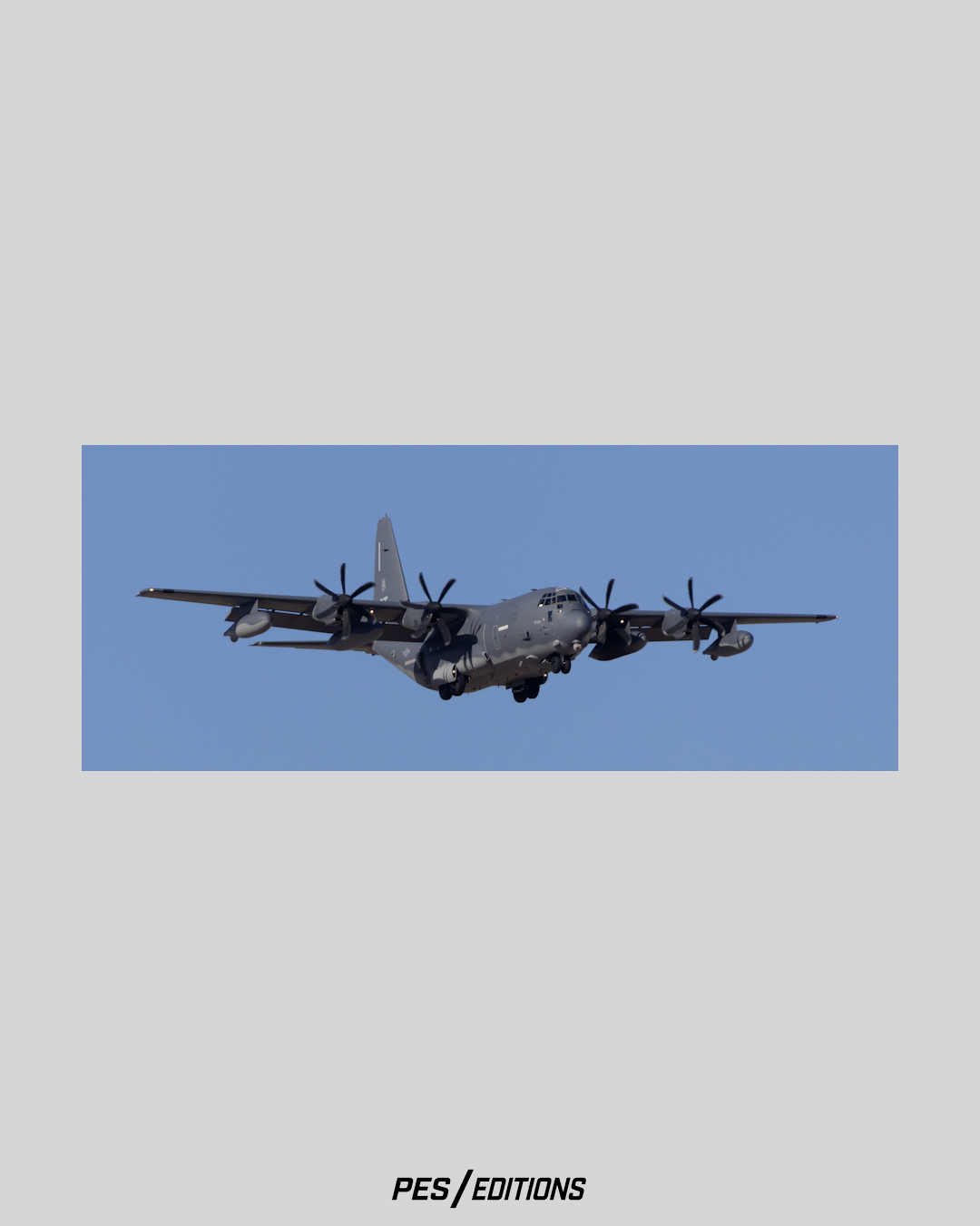 Symmetrical head-on landing profile of a specialized Lockheed EC-130H Compass Call electronic warfare aircraft, Tail 5725 from Davis-Monthan AFB, highlighting its distinct fuselage fairings and blade antennas by Phil Schmauder.