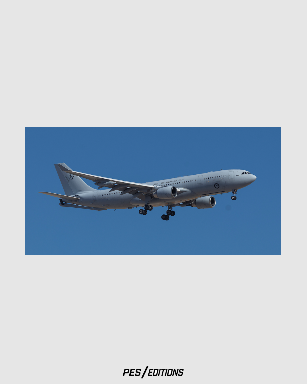 An approach photograph of a Royal Australian Air Force (RAAF) Airbus KC-30A Multi-Role Tanker Transport (A39-005) on final landing descent against a clear blue sky.